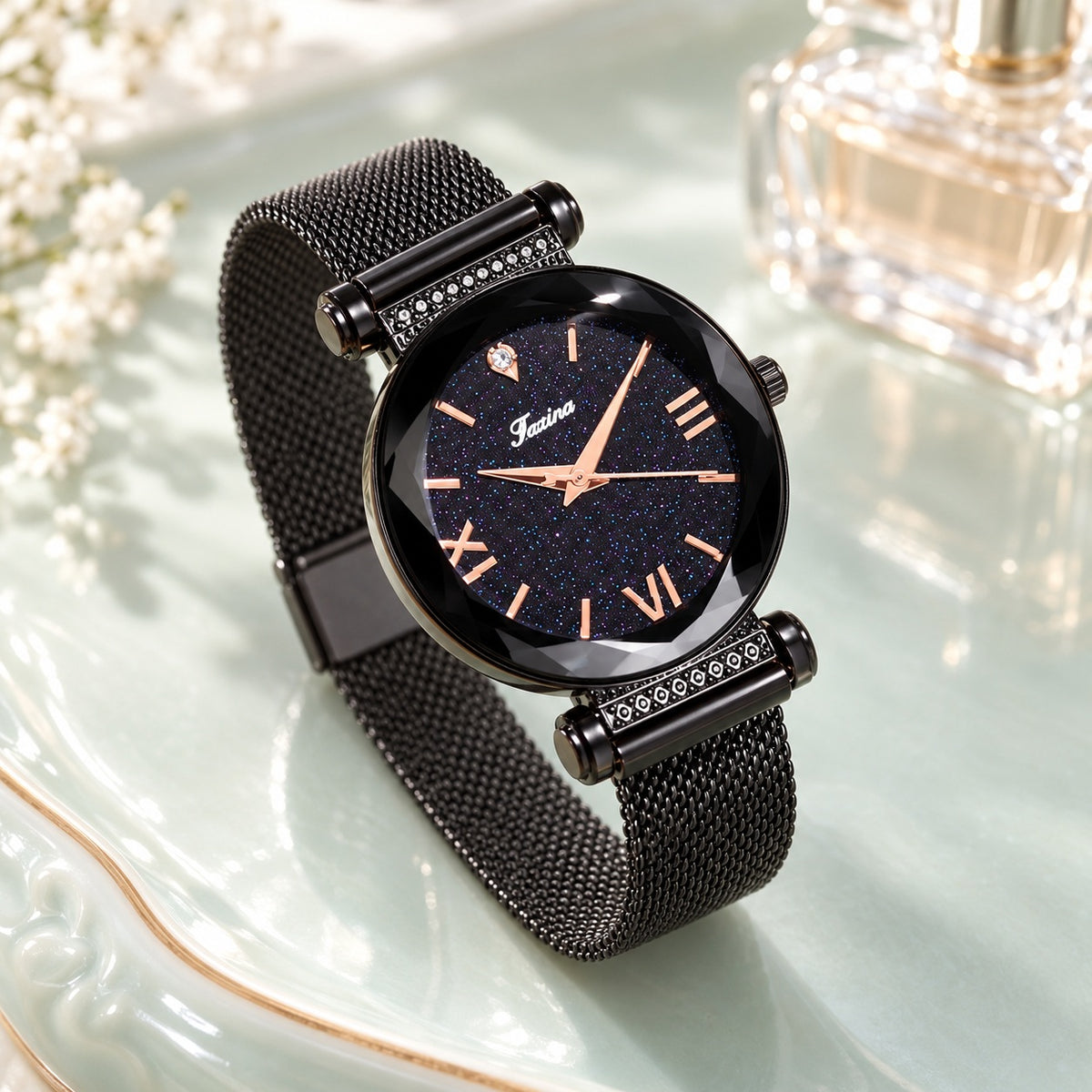 Montre Ciel Étoilé Bracelet Aimanté – boîtier et maille noirs, cadran noir étoilé, chiffres or rose